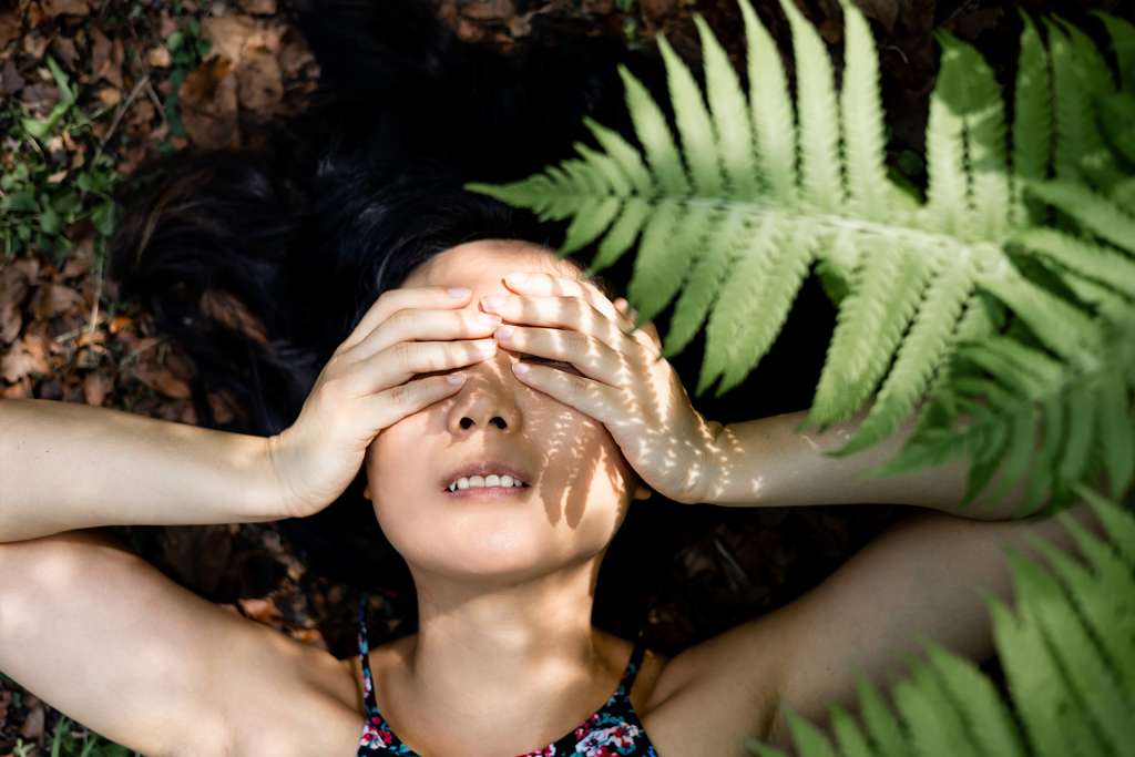 Person covering eyes - anxiety counselling and EMDR therapy support in BC