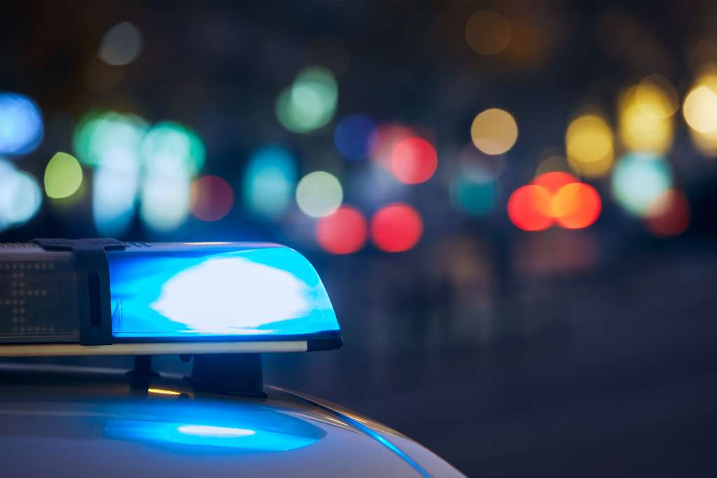 Police car lights at night - trauma counselling for first responders in BC