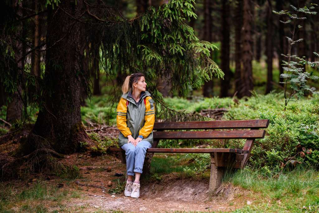 Woman sitting peacefully in nature - women's counselling and trauma therapy in BC