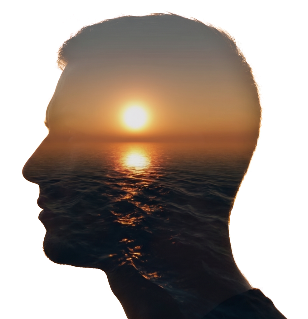Man's silhouette with ocean sunset — representing reflection, inner calm, and the healing process through counselling in Abbotsford, BC